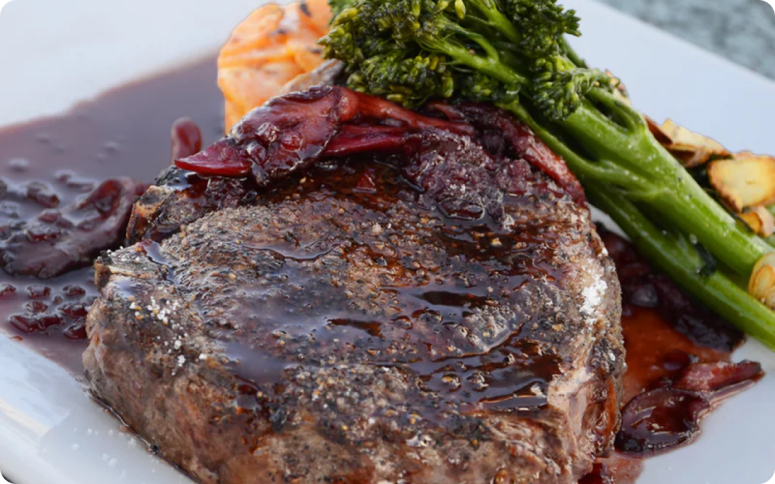 steak with veggies